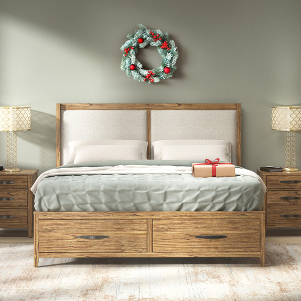 Light wood bedroom with beige upholstered headboard decorated for Christmas