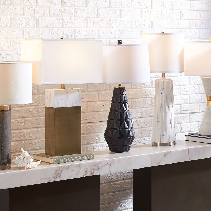 Lamps on a marble end table